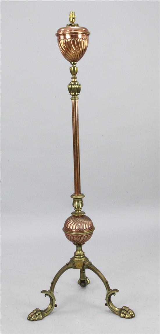 An Edwardian brass and copper oil lamp standard, H.4ft 8in.